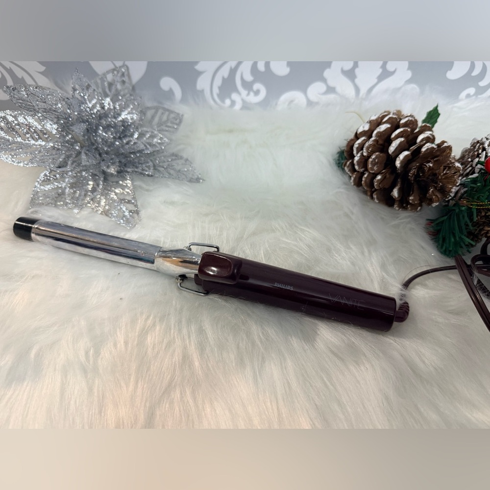 10/$25 •‎ Phillips Vanite Travel Curling Iron
